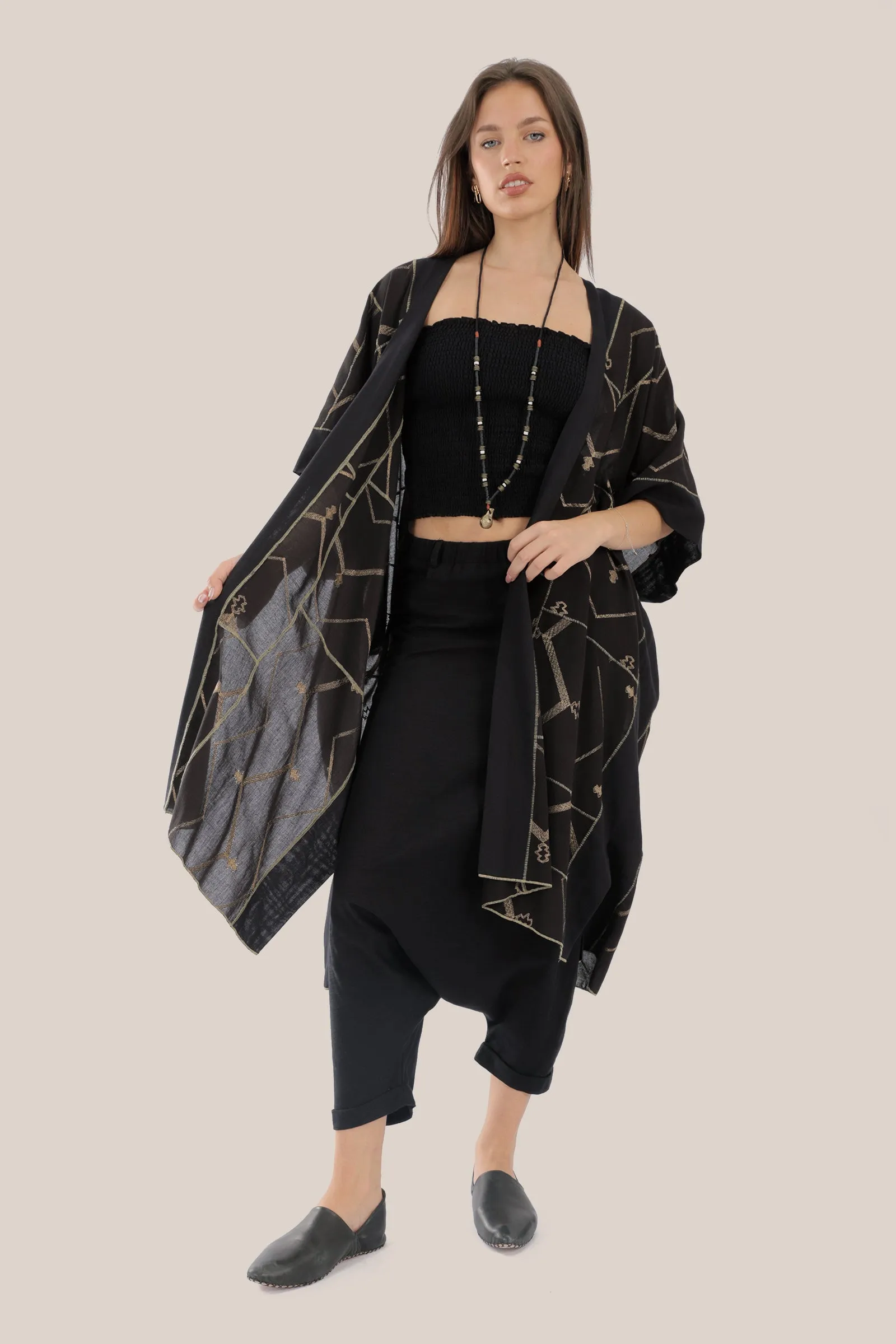 Embroidered loose fit coat with side openings