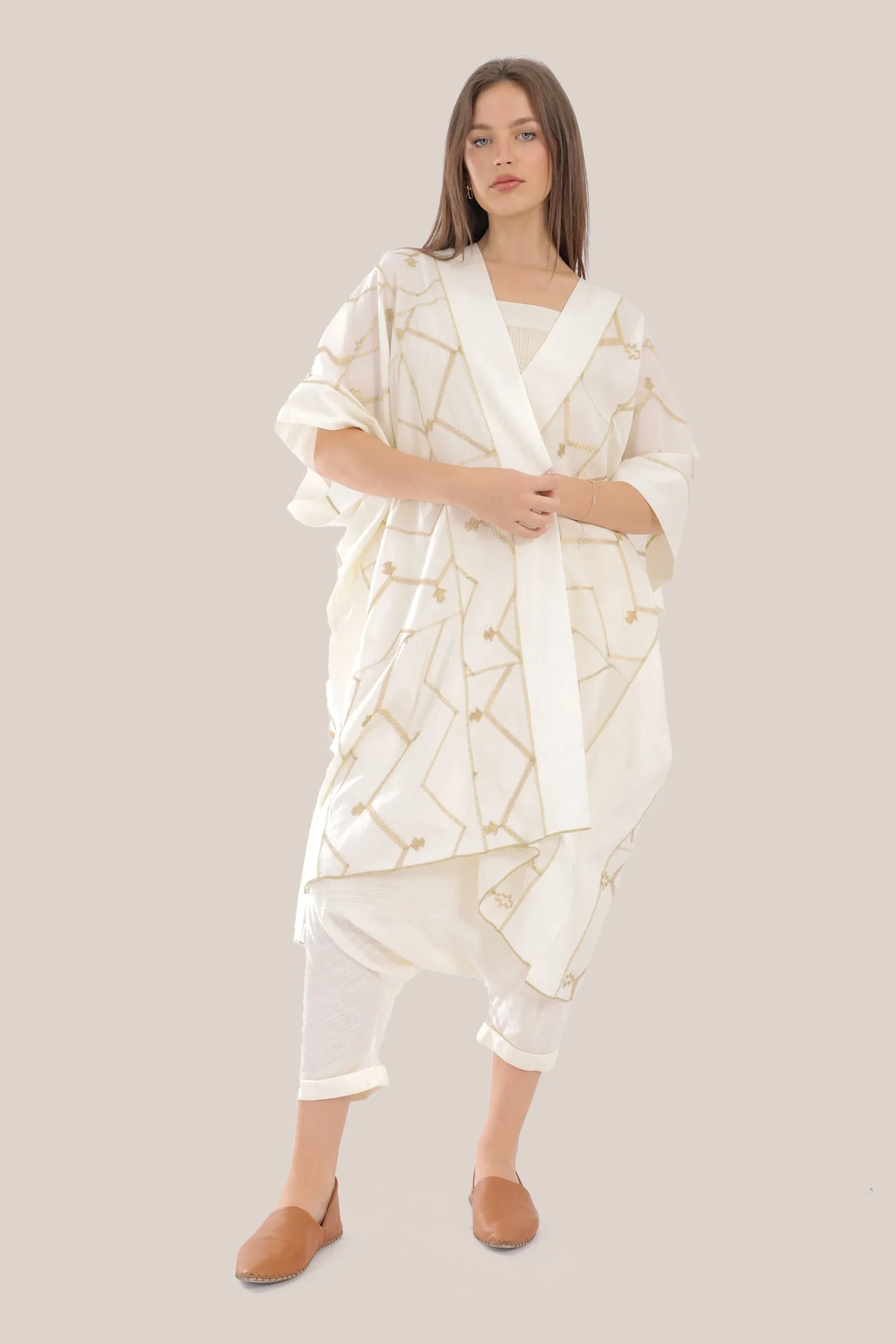 Embroidered loose fit coat with side openings