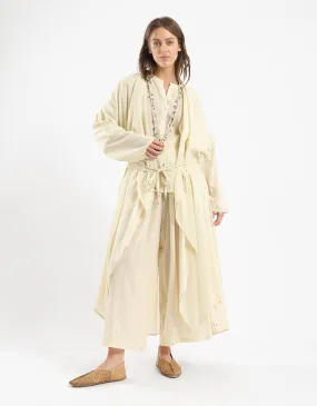 Long draped coat with decorative stitching details on the belt