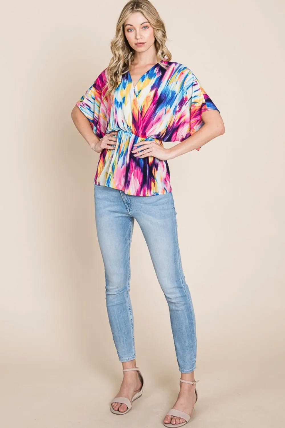 Printed Surplice Peplum Blouse