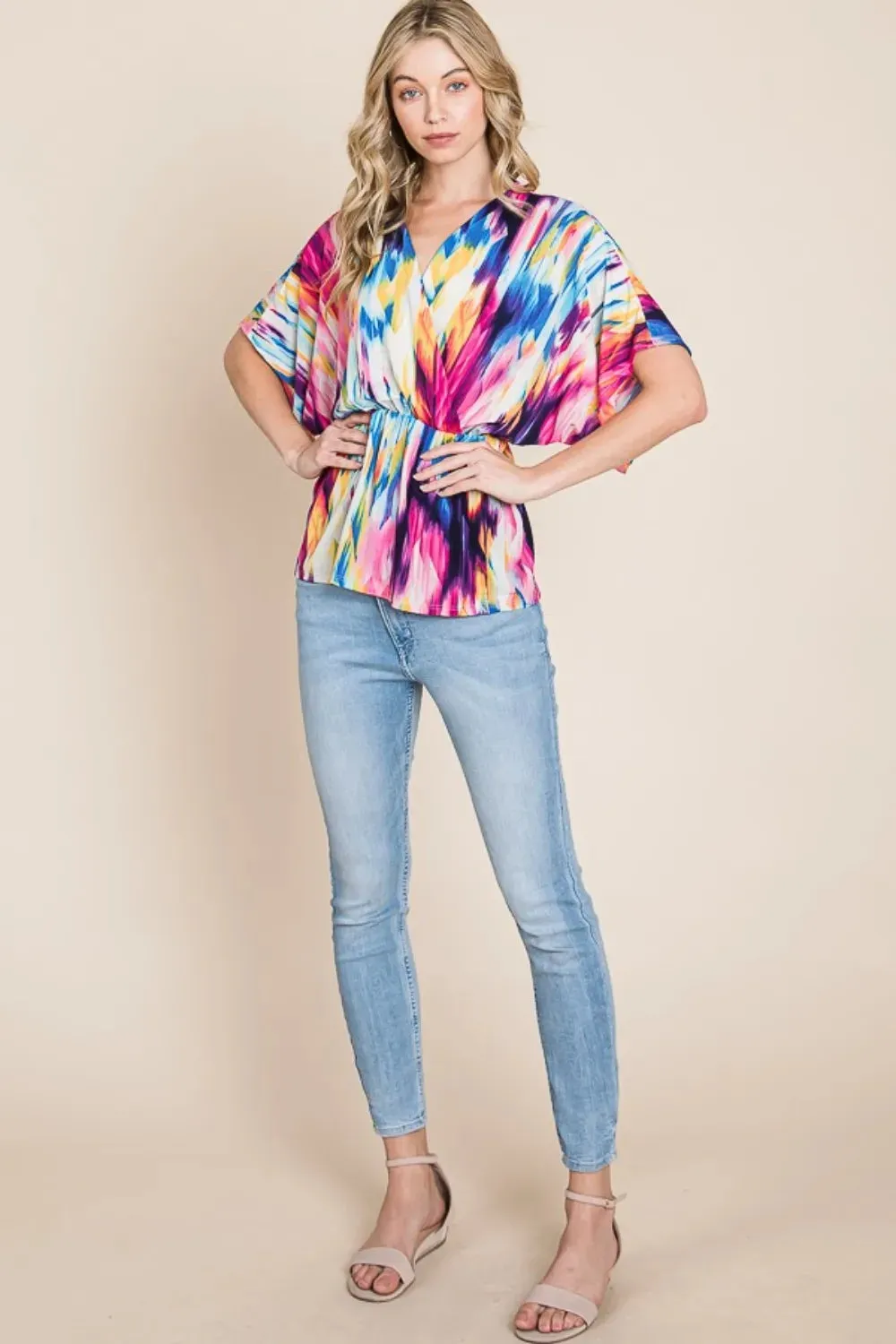 Printed Surplice Peplum Blouse