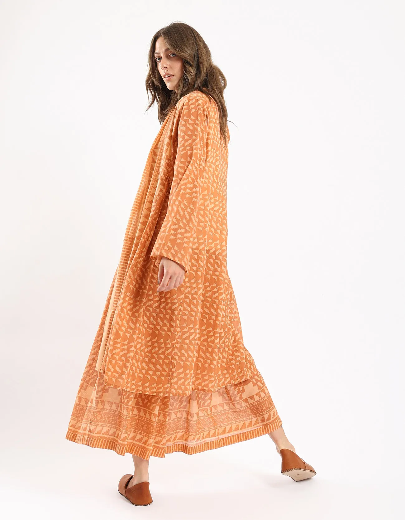 Short printed coat in cotton gauze with ruched on the sides